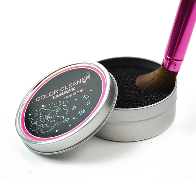 Silicone Makeup Brush Cleaner Mat Language in use, showing a brush cleaning product with a rounded tin container.